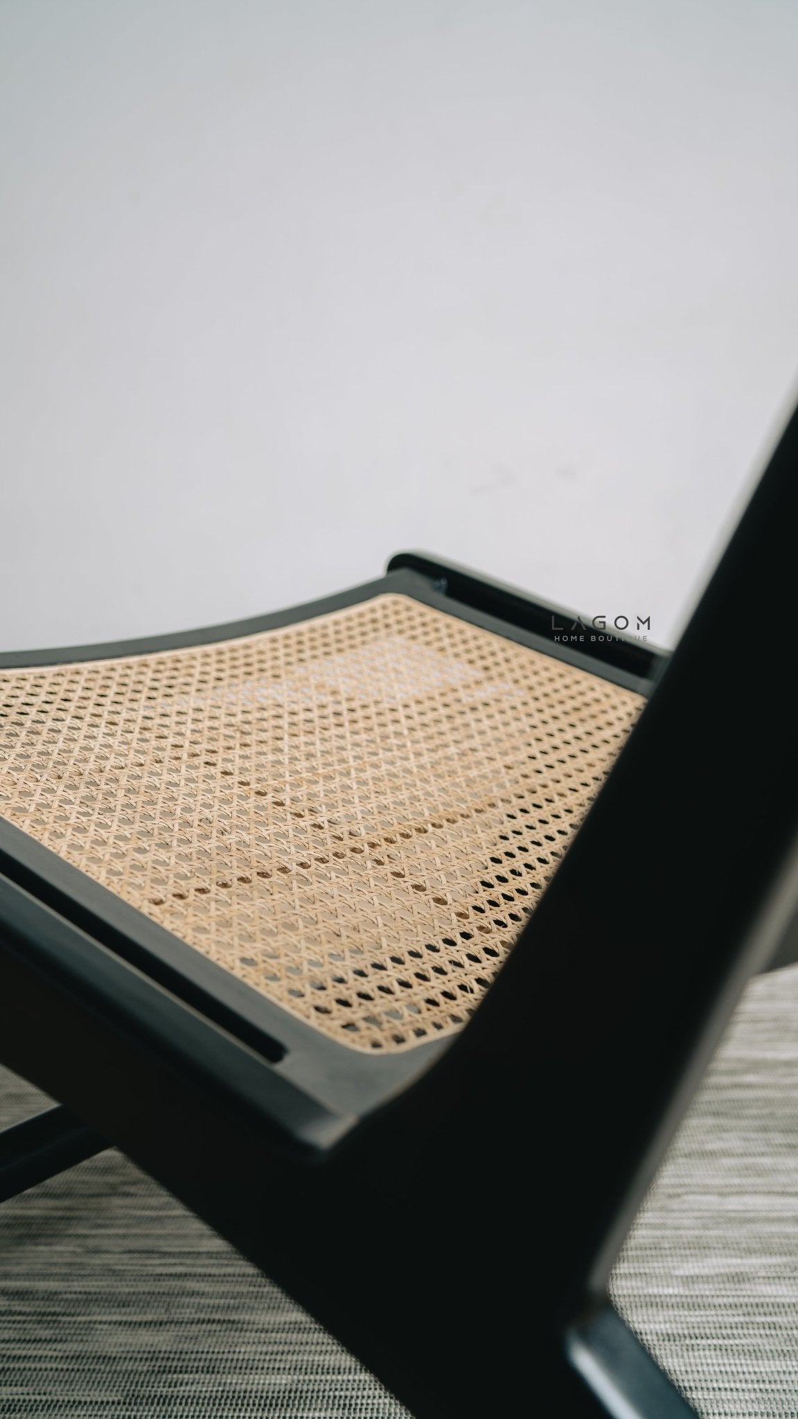 Sleek Black Lounge Chair in Teak and Rattan - Chair - Lagom Home Boutique