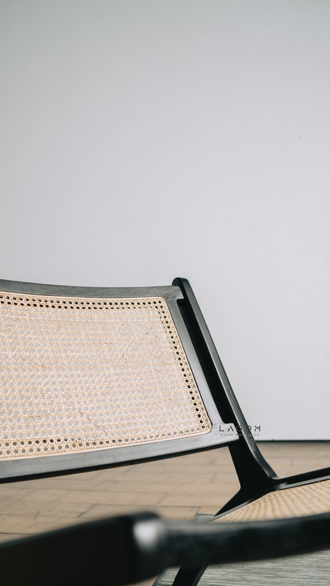 Sleek Black Lounge Chair in Teak and Rattan - Chair - Lagom Home Boutique